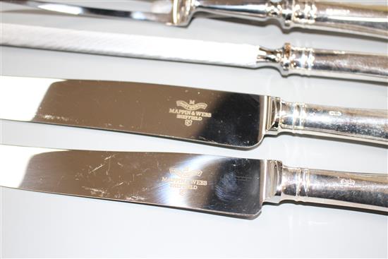 A modern 4 piece silver handled carving set and one hundred and forty three items of plated flatware
